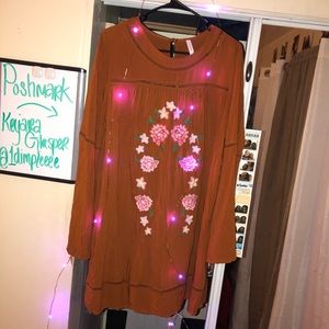 Fall time pumpkin colored floral dress